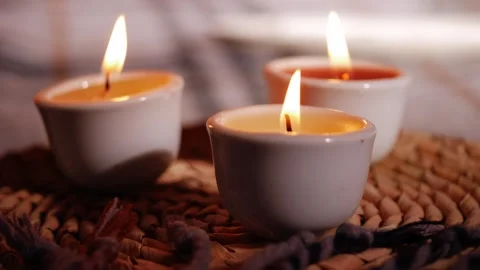 Tea light candles at dinner table Stock Footage 256164590