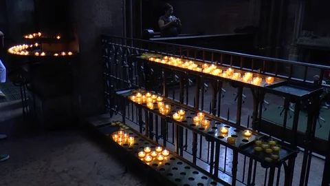 Tea Light Candles inside a Cathedral Stock-Footage 82842524