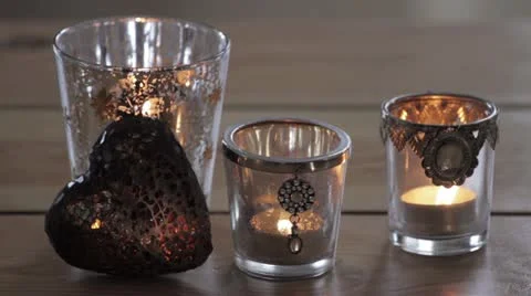 Tea lights and a decorative heart Stock-Footage 24672400