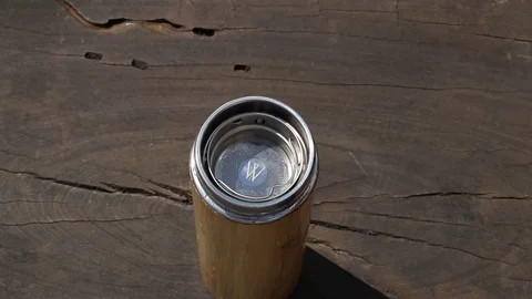 Tea making in bamboo flask with herbs and blue lotus Stock Footage 113178597