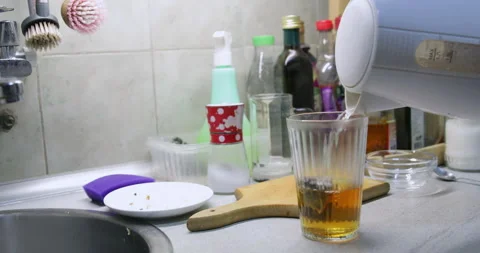 Tea making, pouring boiling water Stock Footage 231611542