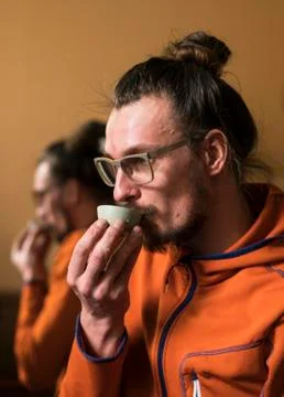 Tea Master is Drinking exquisite Chinese Tea at Traditional Chinese Tea Ceremony Stock Photos