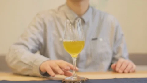 Tea master with a glass of green tea Stock Footage 104332280