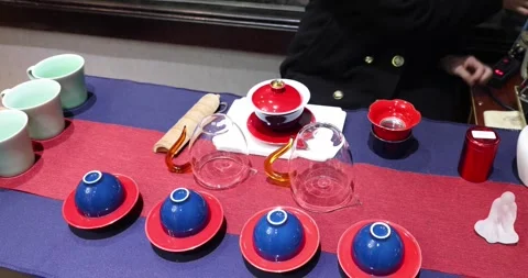 The Tea Master lady meticulously prepares the tea during Traditional Chines.. Stock Footage 261300729