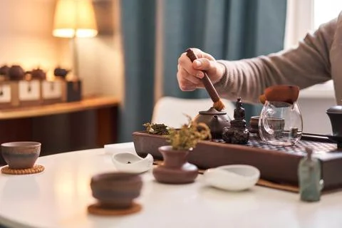 Tea master pours white tea to guests. Everything is ready for the tea ceremony Stock Photos