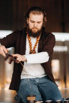 The tea master is preparing to hold a tea ceremony in the interior Stock Photos