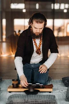 The tea master is preparing to hold a tea ceremony in the interior Stock Photos
