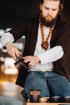The tea master is preparing to hold a tea ceremony in the interior Stock Photos