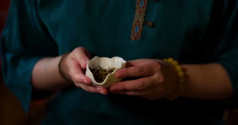The tea master sniffs tea. An element of traditional Chinese tea ceremony. Видео 101060254