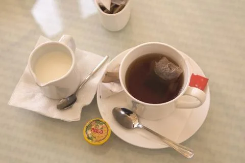 Tea with milk Stock Photos