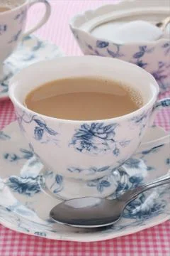 Tea with milk Stock Photos