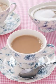 Tea with milk Stock Photos