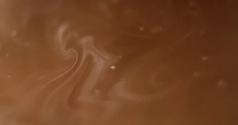 Tea with milk swirls Stock Footage 113905367