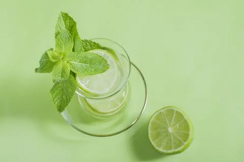Tea with mint and lime, with a calming effect, green still life close-up on a Stock Photos