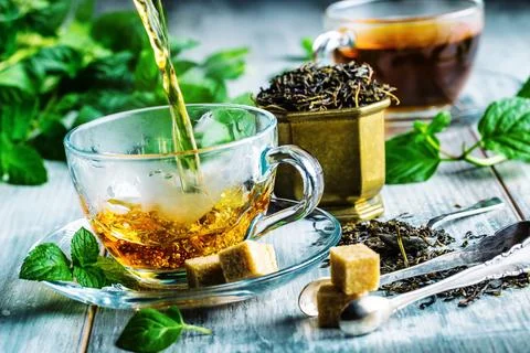 Tea. Mint Tea. Herbal tea. Mint leaf. Mint leaves. Tea in a glass cup, mint.. Stock Photos