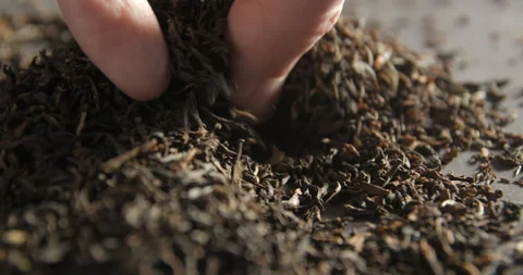 Tea mixing with hands 4K pro res Stock Footage 274906994