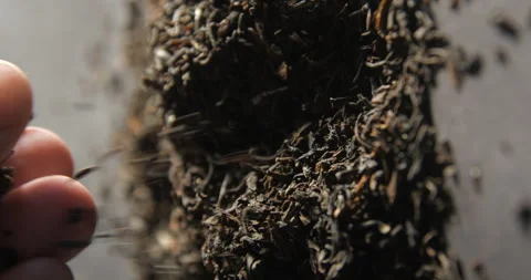 Tea mixing with hands vertical view 4K pro res Stock Footage 274907112