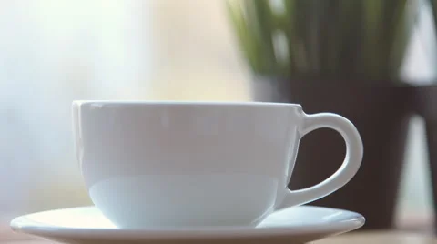 Tea mug is standing on the balcony Stock Footage 68970122