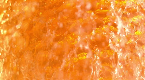 Tea or Beer Liquid Burst in super Slow Motion Light Color high speed Stock Footage 64949270