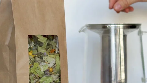 Tea pack, brown kraft recycled paper with window, natural  leaves, Stock Footage 180071553