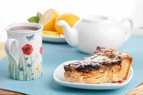 Tea with pie slice Stock Photos