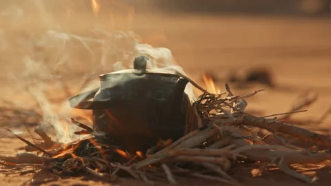 Tea Pot at the Camp Fire in Jordan Wadi Rum desert Stock Footage 271604032