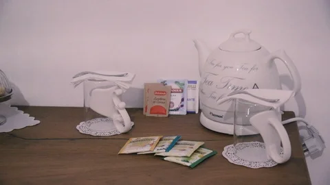 Tea pot with cups and tea flavors Stock Footage 86171699