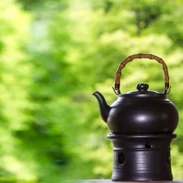 Tea pot with nice background Stock Photos