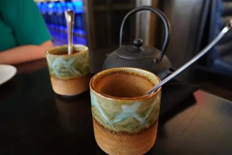 Tea pot with two cups Stock Photos