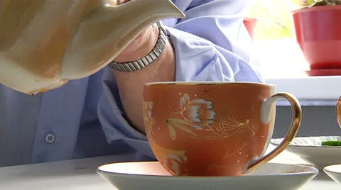 The tea is poured into a Cup Stock Footage 25418482