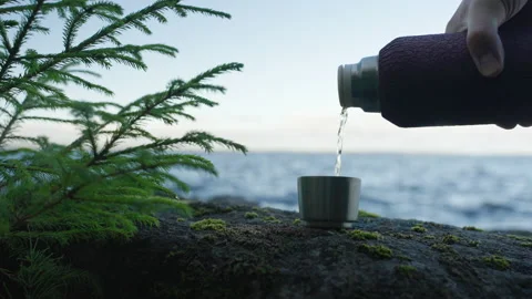 Tea is poured from a thermos Video stock 219679582