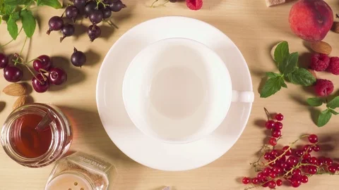 Tea is poured into a white cup Video stock 91896442
