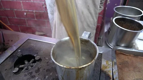 Tea Pouring Between Pots Street Brewing Style Video stock 332423548