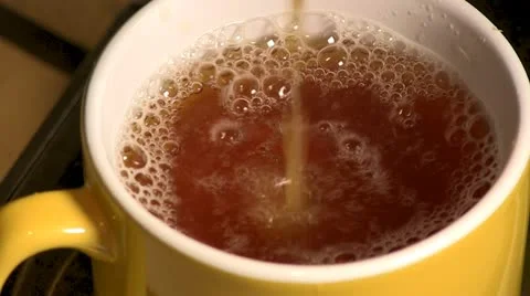 Tea Pouring - Bubbles Video stock 12288348