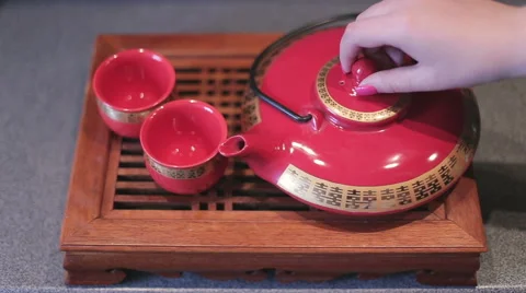 Tea pouring in chines cup Stock Footage 56480843