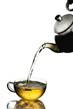 Tea pouring concept Stock Photos