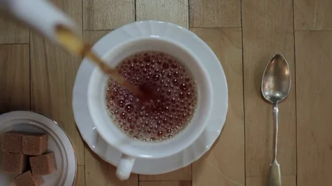 Tea pouring in cup Stock Footage 72368275