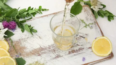 Tea pouring in the cup Stock Footage 132349284