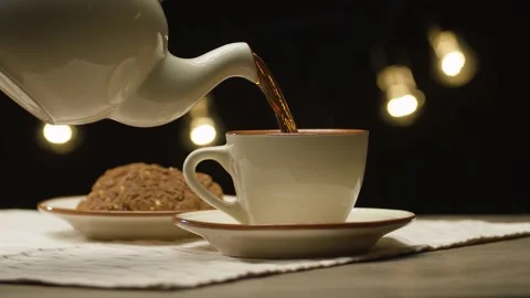 Tea pouring into a cup Stock Footage 140403631