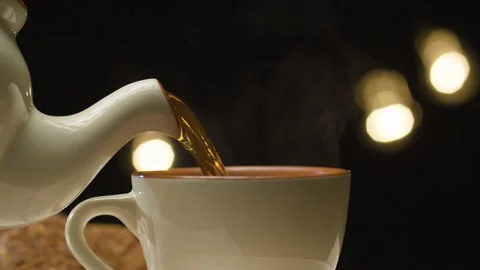 Tea pouring into a cup Stock Footage 140403777
