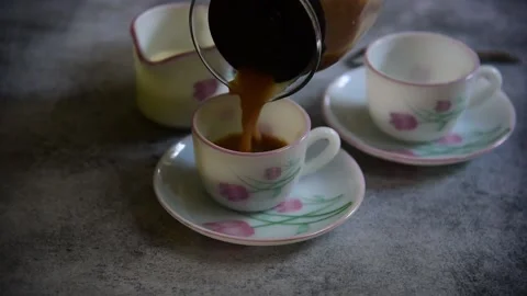 Tea pouring in cups Stock Footage 154199569