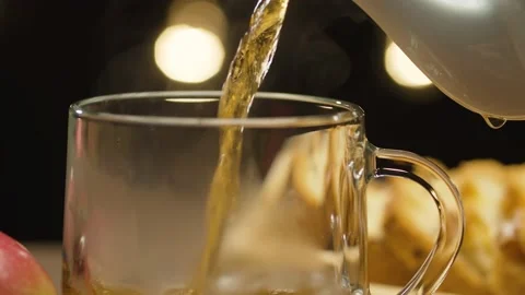 Tea pouring into glass mug Stock Footage 140402989