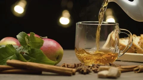 Tea pouring into glass mug Stock Footage 143587136