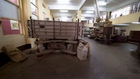 Tea processing. Machinery separates and processes the tea leaves. Ooty, India Stock Footage 93623545