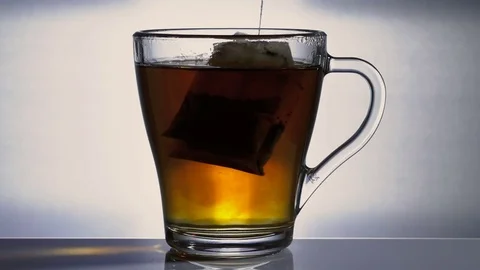 Tea is ready in a cup with hot water Stockbeeldmateriaal 73278196