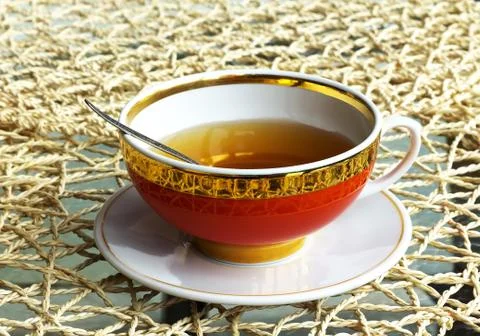 Tea in red cup Stock Photos