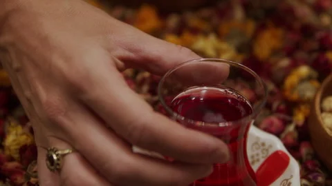 Tea in a Red Glass Stock Footage 268767008