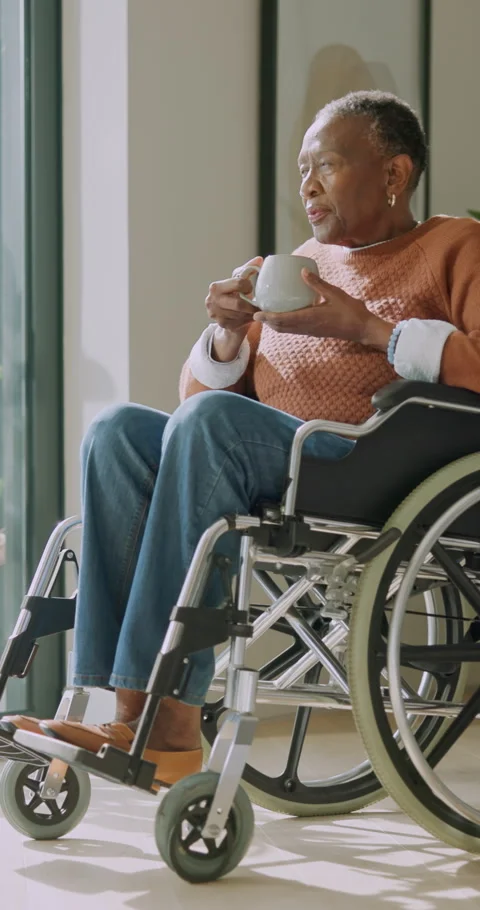 Tea, reflection and old woman in nursing home with wheelchair, daydream or Stock Footage 346824798