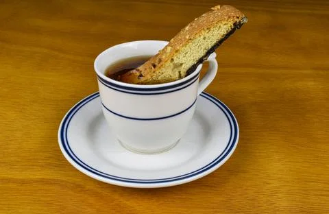 Tea with s chocolate biscotti Stock Photos