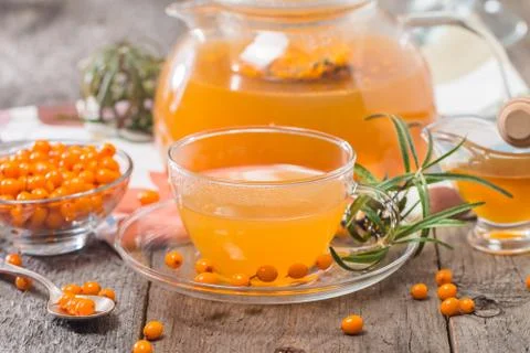 Tea with sea buckthorn Stock Photos